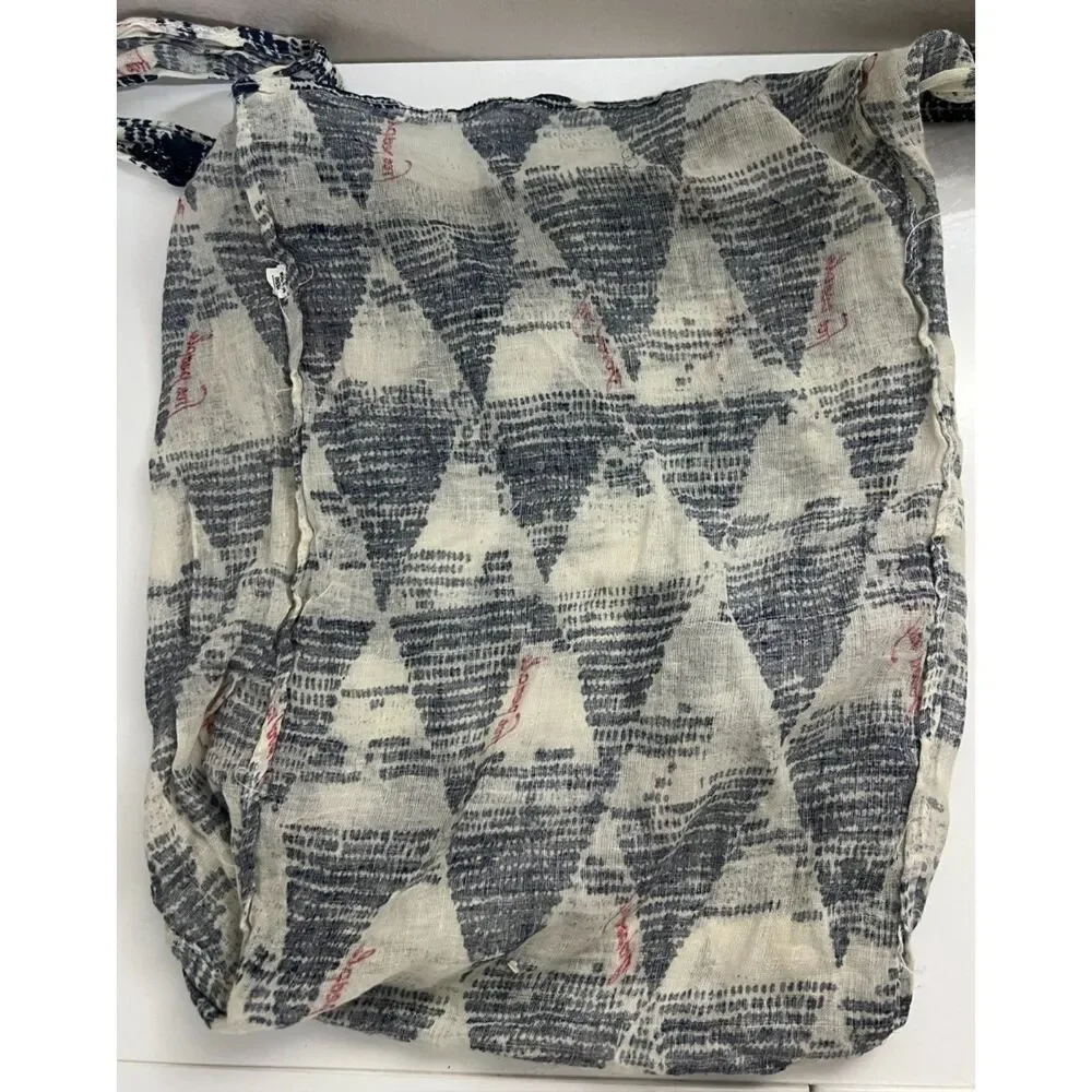 Free People sheer tote/hobo with a geometric design.
